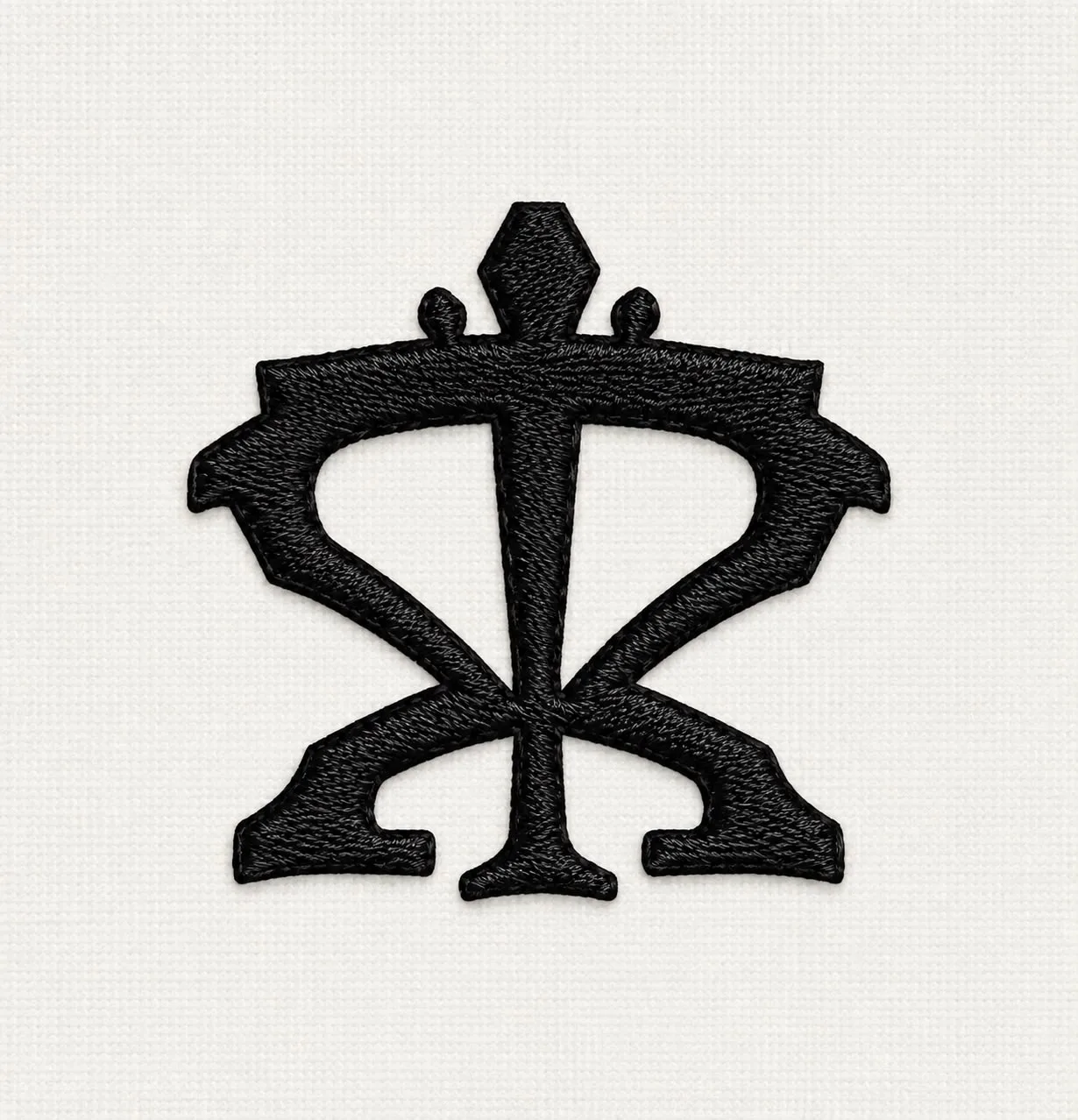 Monograma TK bordado — logo Tony Krown